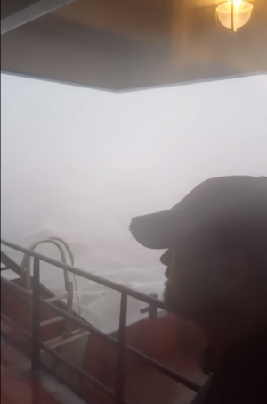 Capt. Newberry surveys the storm surge Hurricane Ida is bringing from the bridge of his supply vessel in Grand Isle, LA on Sunday August 29, 2021